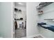 Walk-in closet has built-in shelving for storage at 7724 Dunleer Dr, Brownsburg, IN 46112