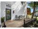 Cozy front porch with outdoor seating and an ornate door, perfect for relaxing at 8 W Jackson St, Knightstown, IN 46148