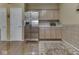 Kitchen with stainless steel refrigerator and modern cabinets at 811 Gazebo Way, Greenwood, IN 46142