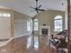 Spacious living room features a fireplace, hardwood floors, and plenty of natural light at 811 Gazebo Way, Greenwood, IN 46142