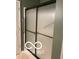 Bathroom featuring standing shower with black metal trim and sliding doors at 811 Gazebo Way, Greenwood, IN 46142