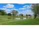 An aerial view of the community pond at 8121 Sand Ridge Cir, Indianapolis, IN 46237