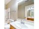 Bathroom featuring a large vanity with a sink and faucet, a mirror, and a shower-tub combo at 8121 Sand Ridge Cir, Indianapolis, IN 46237