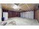Spacious garage with installed door and garage door opener at 8121 Sand Ridge Cir, Indianapolis, IN 46237