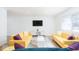 Bright living room features sleek, modern furnishings and hardwood floors at 8744 Montery Ct, Indianapolis, IN 46226