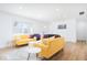 Bright living room features sleek, modern furnishings and hardwood floors at 8744 Montery Ct, Indianapolis, IN 46226