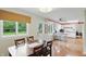 Open floor plan with a dining area that connects the living area and the kitchen at 8752 Washington Blvd E Dr, Indianapolis, IN 46240