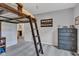 Bedroom featuring a unique lofted bed design with ladder and adjacent closet at 8973 Carnation Dr, Noblesville, IN 46060