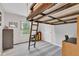 Bedroom featuring a unique lofted bed design with wood and ladder at 8973 Carnation Dr, Noblesville, IN 46060