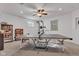 Finished basement game room featuring a ceiling fan, ping pong table, and pull up bar at 8973 Carnation Dr, Noblesville, IN 46060