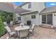 Stamped concrete patio featuring dining area, grill, and access to house at 8973 Carnation Dr, Noblesville, IN 46060