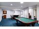 Finished basement featuring a pool table, bar area, and neutral decor, perfect for entertaining at 9154 Sargent Manor Ct, Indianapolis, IN 46256