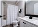 Bathroom with vanity, black faucet and shower with curtain at 9154 Sargent Manor Ct, Indianapolis, IN 46256