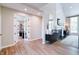 Spacious living room features a fireplace, built-ins, and French doors that open to another room at 9154 Sargent Manor Ct, Indianapolis, IN 46256