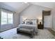 Spacious main bedroom with vaulted ceiling, large windows and accent furniture at 9154 Sargent Manor Ct, Indianapolis, IN 46256