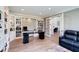 Open and airy office featuring a large built-in desk and view to another room at 9154 Sargent Manor Ct, Indianapolis, IN 46256