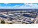 Expansive aerial view of a complex in a bustling urban area with highway access and ample parking at 1015 N Beville Ave, Indianapolis, IN 46201