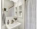 Modern bathroom featuring a white sink, bronze faucet, and shower with curtain at 1015 N Beville Ave, Indianapolis, IN 46201