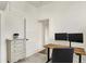 Bright office space featuring neutral décor and an antique chest of drawers at 1015 N Beville Ave, Indianapolis, IN 46201
