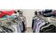 Spacious walk-in closet offering generous storage with hanging space for shirts, blouses, and pants at 1015 N Beville Ave, Indianapolis, IN 46201