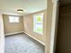 View of the bedroom with grey carpet at 104 W Pearl St, Trafalgar, IN 46181