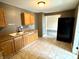 View of the kitchen with linoleum flooring at 104 W Pearl St, Trafalgar, IN 46181