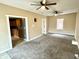 Image shows living room leading to the kitchen at 104 W Pearl St, Trafalgar, IN 46181