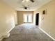 Image shows living room leading to a patio at 104 W Pearl St, Trafalgar, IN 46181