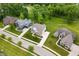 Aerial view of the property highlighting its location in a neighborhood with mature trees at 10505 Golden Bear Way, Noblesville, IN 46060