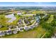 Community aerial view showing the golf course, ponds, and neighborhood layout at 10505 Golden Bear Way, Noblesville, IN 46060