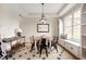 Bright dining area with a round table, natural light, and stylish decor at 10505 Golden Bear Way, Noblesville, IN 46060