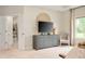 Main bedroom featuring a walk-in closet, dresser, and decorative chair at 10505 Golden Bear Way, Noblesville, IN 46060