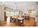 Spacious open-concept layout blending the dining and living areas with an adjacent modern kitchen at 10505 Golden Bear Way, Noblesville, IN 46060