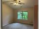 Cozy bedroom with a large window showcasing the outdoor view at 11014 Lake Run Dr, Fishers, IN 46038