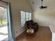 Bright living room with access to the backyard, offering seamless indoor-outdoor living at 11014 Lake Run Dr, Fishers, IN 46038