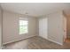 Neutral bedroom with carpet, natural light from window and sliding door closet at 11051 Oakridge Dr, Fishers, IN 46038