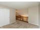 Bedroom showing carpet, closet and railing overlooking another floor at 11051 Oakridge Dr, Fishers, IN 46038