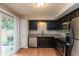 Updated kitchen with stainless steel appliances, granite countertops, and plenty of cabinet space at 11051 Oakridge Dr, Fishers, IN 46038