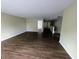Open-concept living space with wood floors and easy access to other rooms at 11343 Congaree Way, Indianapolis, IN 46235