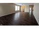 Spacious living room featuring wood floors and a view to the hallway and entry at 11343 Congaree Way, Indianapolis, IN 46235