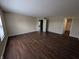 Spacious living room with hardwood flooring and neutral paint, creating a bright and welcoming atmosphere at 11343 Congaree Way, Indianapolis, IN 46235