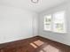 Bright bedroom with hardwood floors, fresh paint and natural light at 1209 W 22Nd St, Anderson, IN 46016