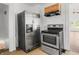 Kitchen with stainless steel appliances and view of living room at 1209 W 22Nd St, Anderson, IN 46016