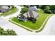 Beautiful brick home featuring mature landscaping and a well-maintained lawn in a desirable neighborhood at 121 George Ct, Danville, IN 46122