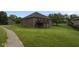 A shot of the backyard showing the walkout deck from the home at 121 George Ct, Danville, IN 46122