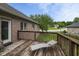 A wooden deck features railing and a lounge chair at 121 George Ct, Danville, IN 46122