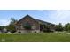 Charming brick home with well-manicured lawn and a tasteful stone accent base at 121 George Ct, Danville, IN 46122