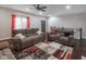 Well-lit living room featuring two comfortable gray couches at 121 George Ct, Danville, IN 46122