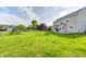 Wide angle view of a well-manicured and massive backyard at 1306 Flat Wood Ct, Brownsburg, IN 46112
