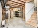 Partially finished basement featuring exposed ductwork, stairs, and wood-framed walls for a unique design at 1306 Flat Wood Ct, Brownsburg, IN 46112